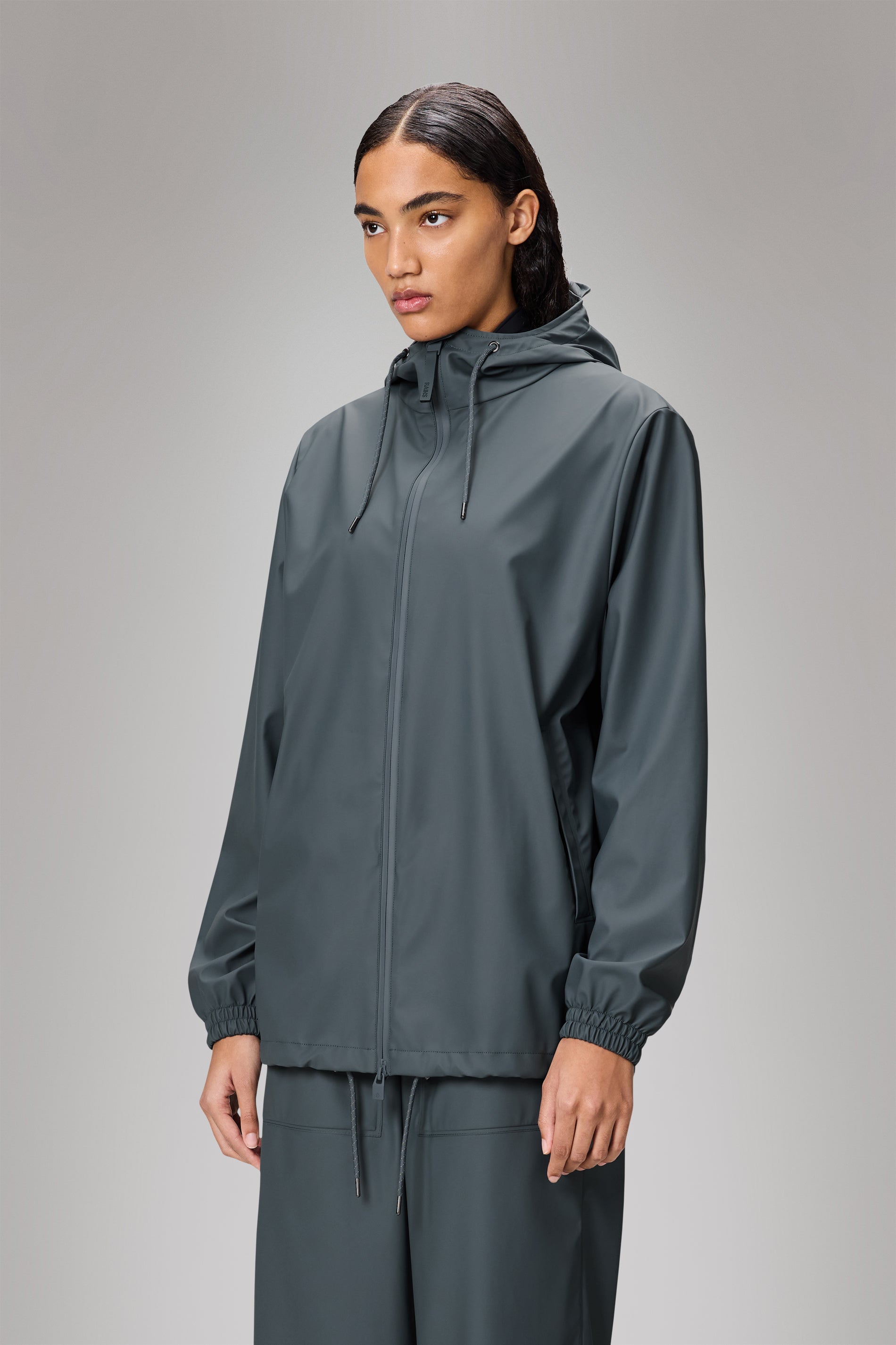 RAINS Storm Breaker Lagoon Jacket